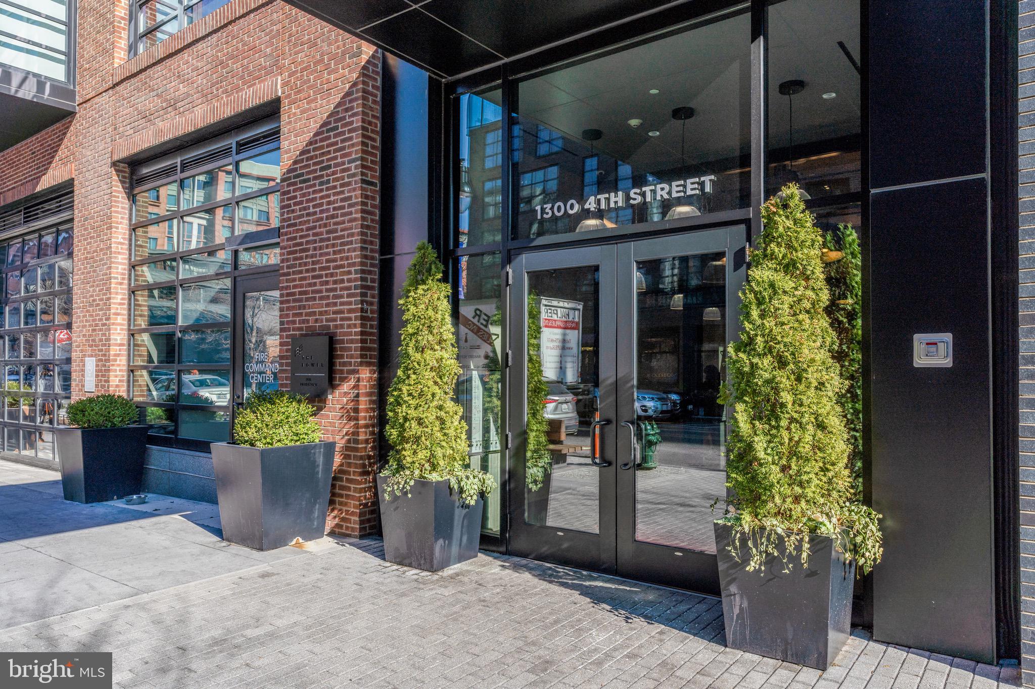 1300 4th Street Southeast, Unit 715 Washington, DC 20003 - Photo 43 of 47 a view of a porch with potted plants