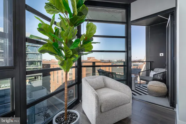 a view of living room filled with furniture