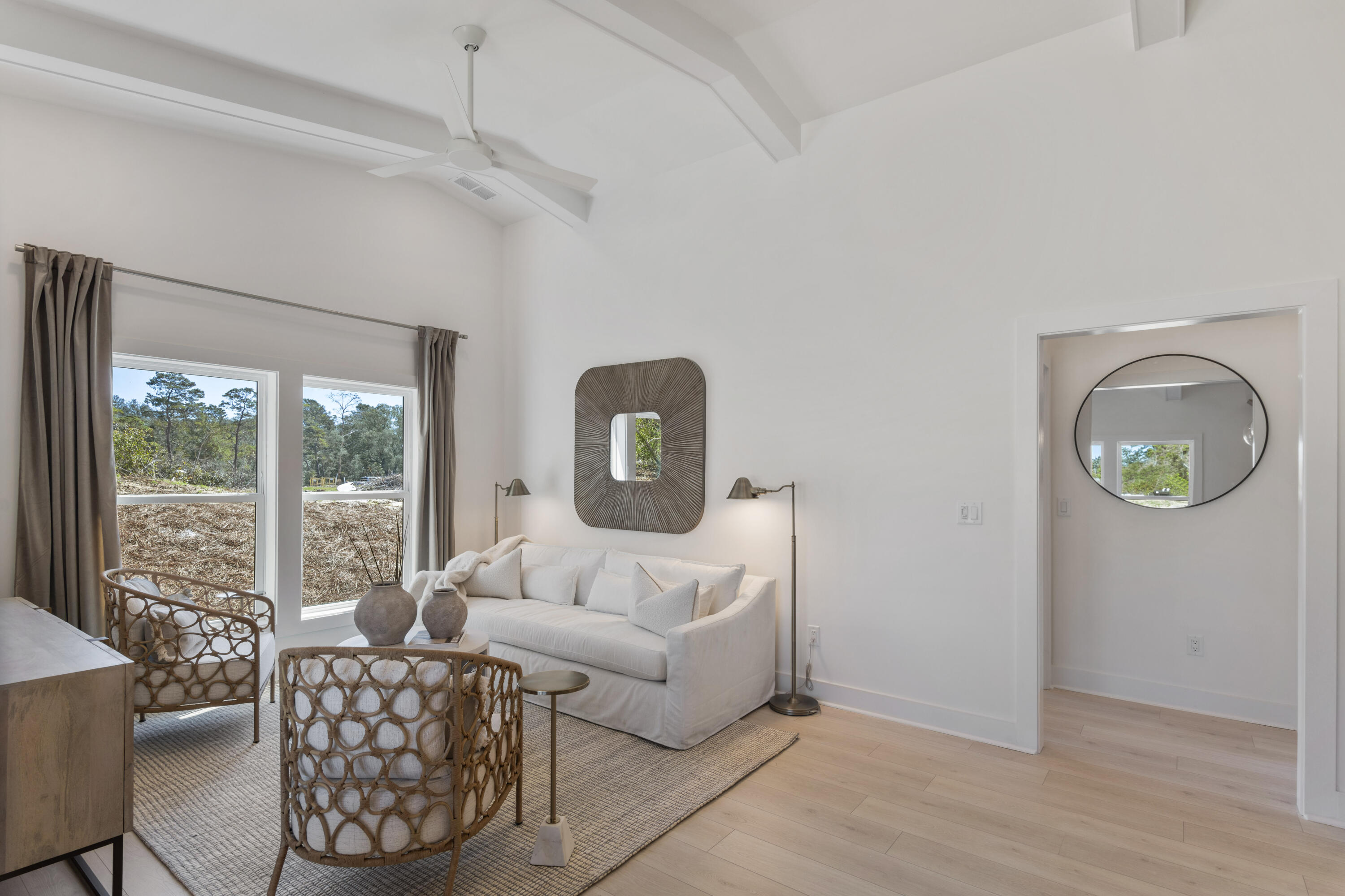 31 Asher St Inlet Beach, Unit LOT 43 Inlet Beach, FL 32461 - Photo 11 of 44 a living room with furniture and a window