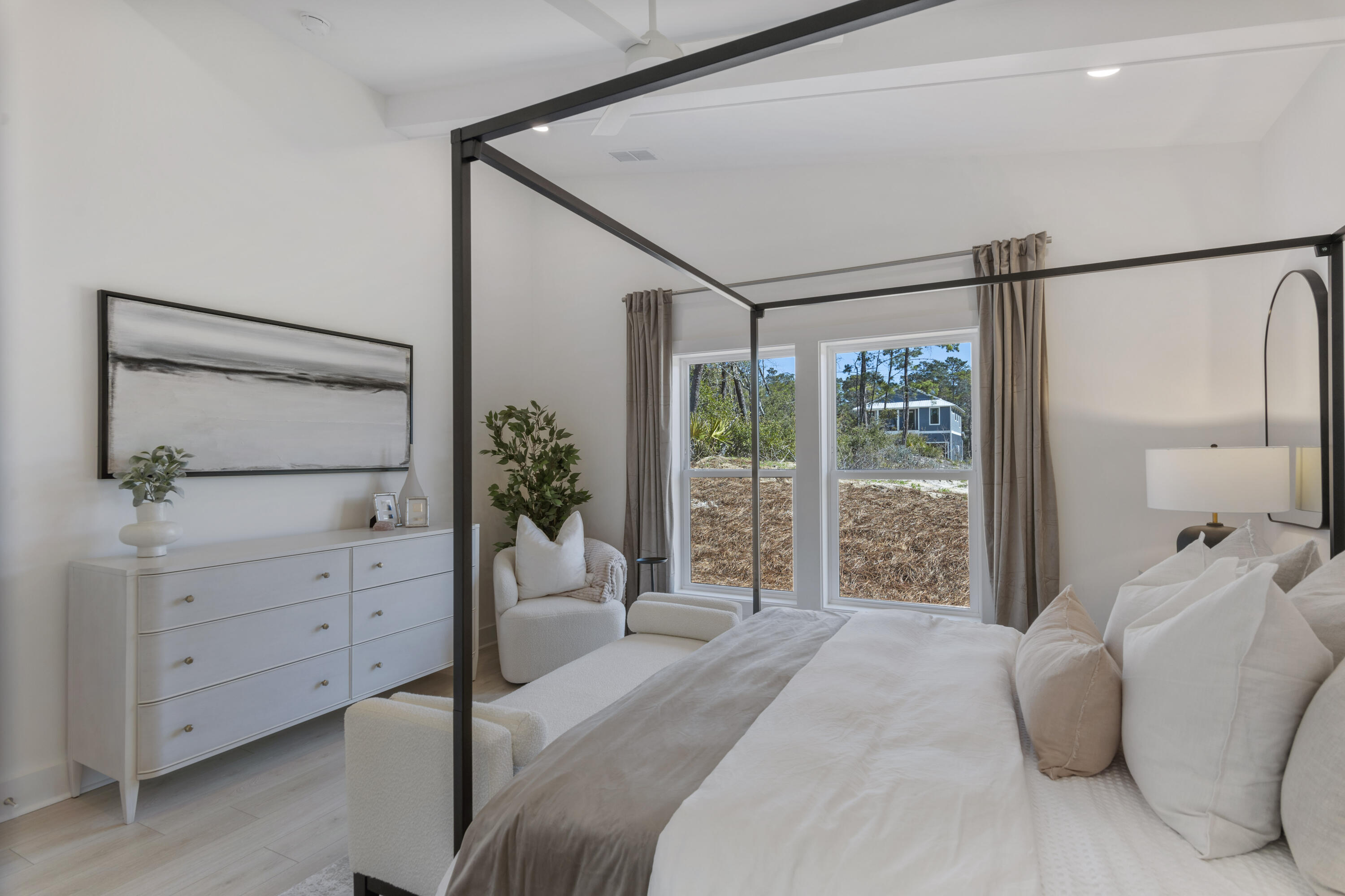 31 Asher St Inlet Beach, Unit LOT 43 Inlet Beach, FL 32461 - Photo 15 of 44 a bedroom with a large bed and a window