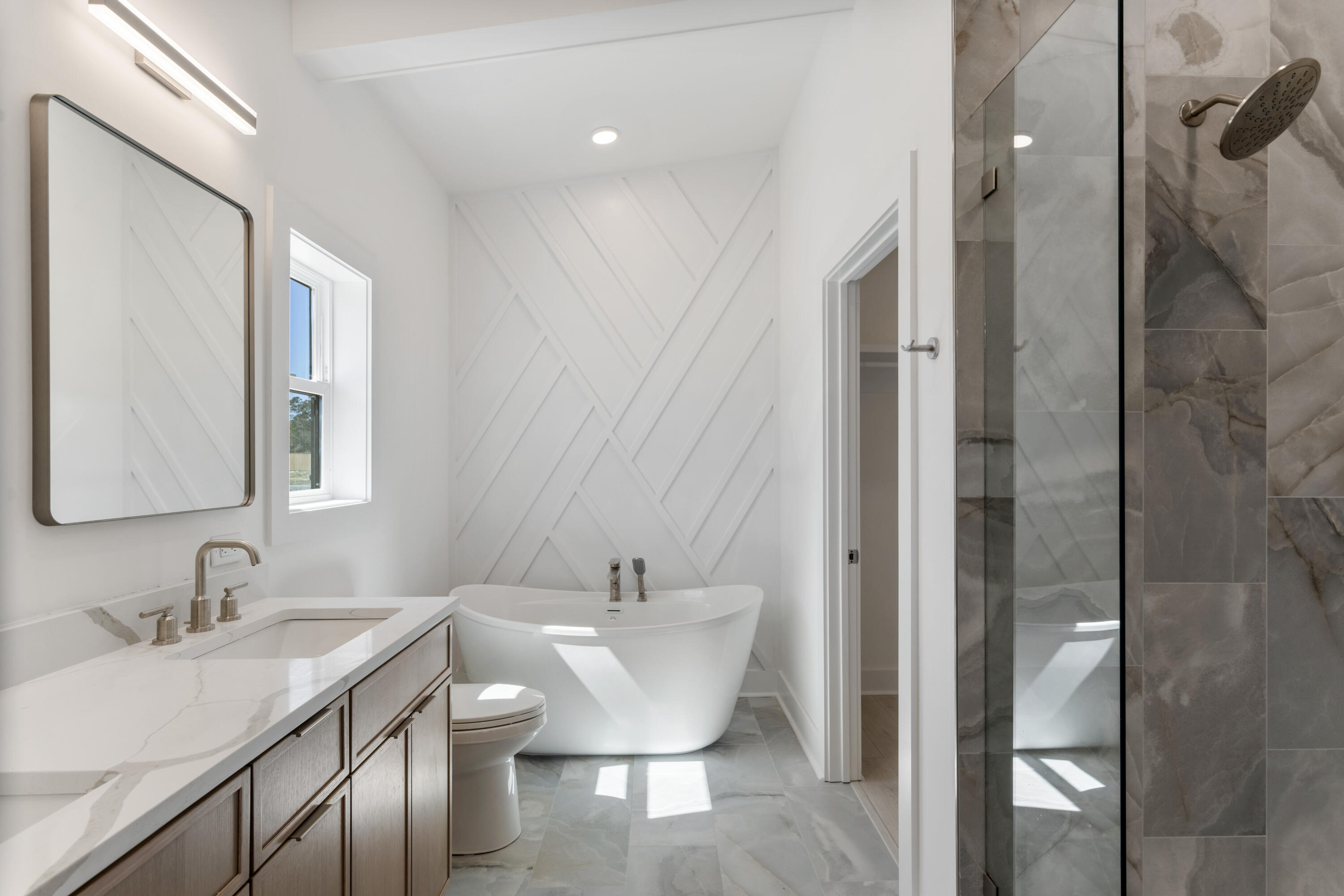 31 Asher St Inlet Beach, Unit LOT 43 Inlet Beach, FL 32461 - Photo 18 of 44 a bathroom with a sink and a mirror