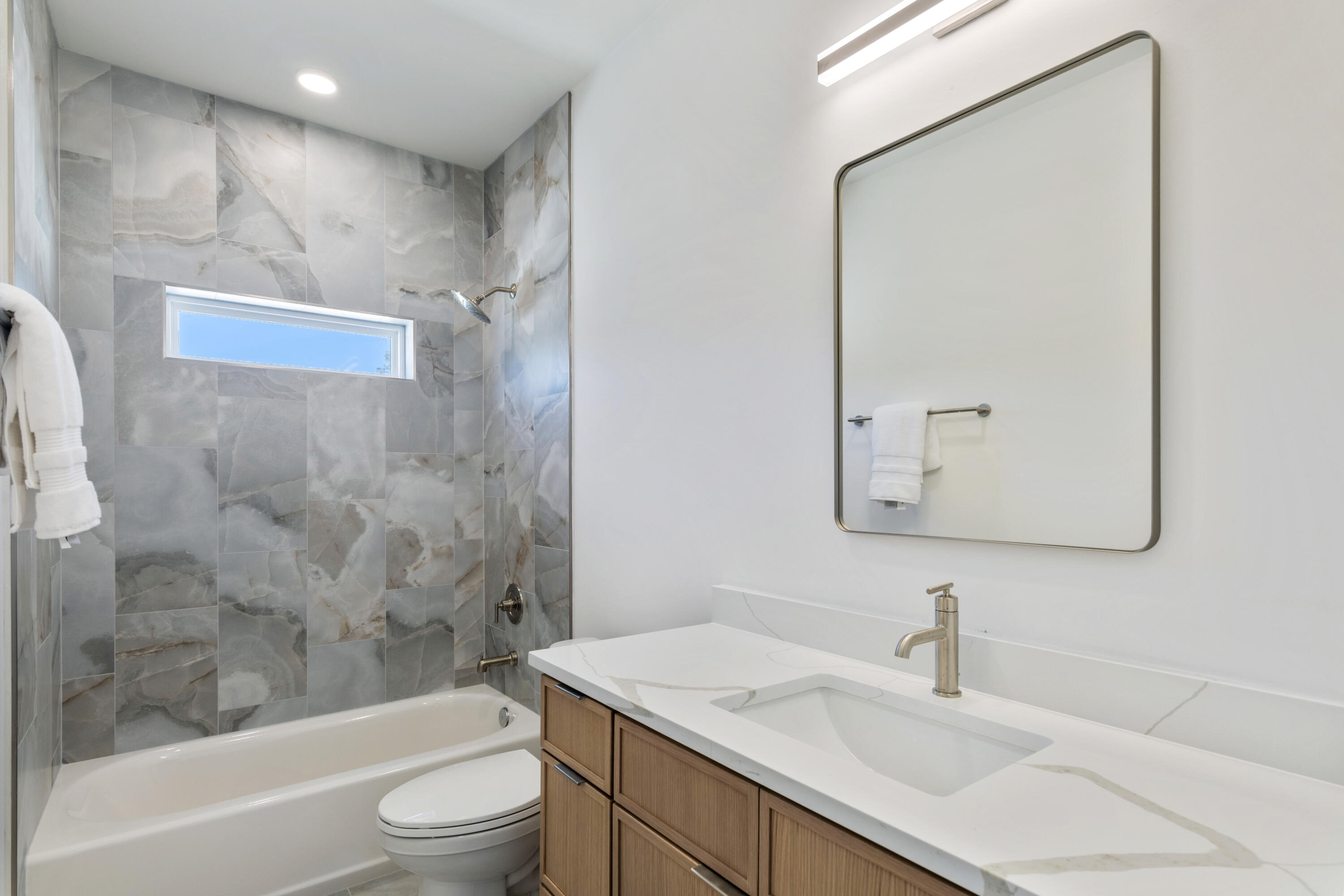 31 Asher St Inlet Beach, Unit LOT 43 Inlet Beach, FL 32461 - Photo 23 of 44 a bathroom with a sink a toilet and shower