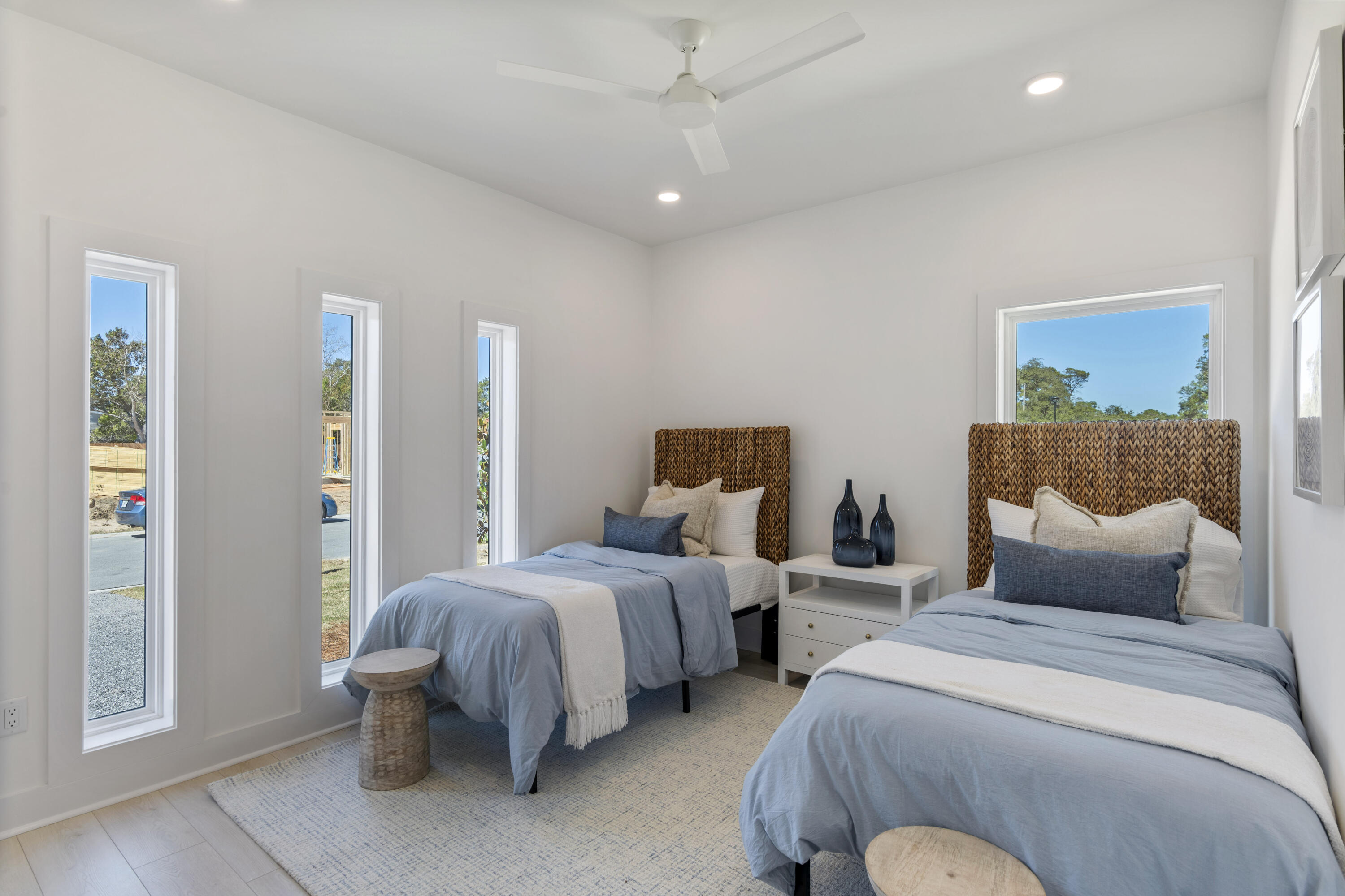 31 Asher St Inlet Beach, Unit LOT 43 Inlet Beach, FL 32461 - Photo 24 of 44 a bedroom with bed and a chandelier