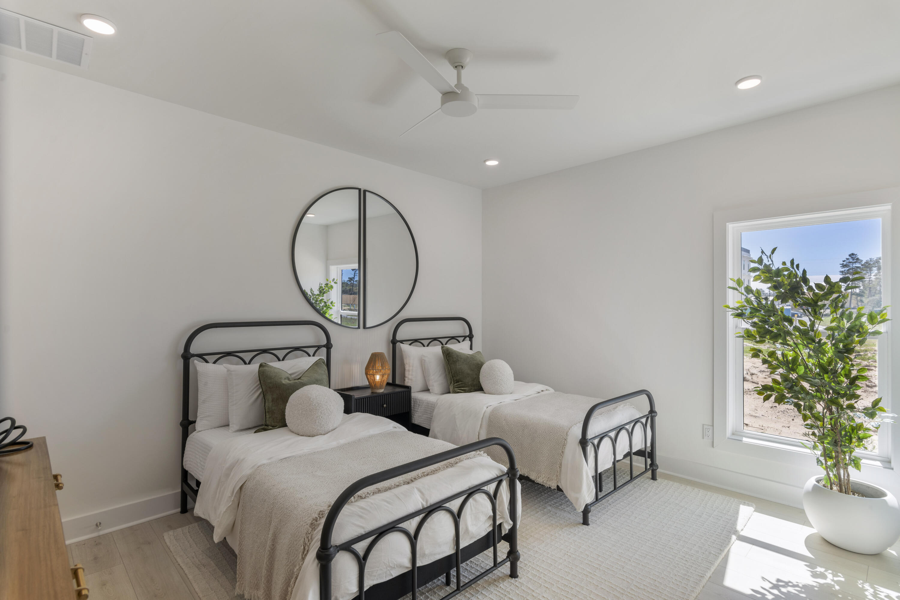 31 Asher St Inlet Beach, Unit LOT 43 Inlet Beach, FL 32461 - Photo 26 of 44 a bed room with two beds and a potted plant