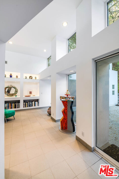 12309 Viewcrest Road Studio City, CA 91604 - Photo 16 of 52 a view of a room with gym equipment