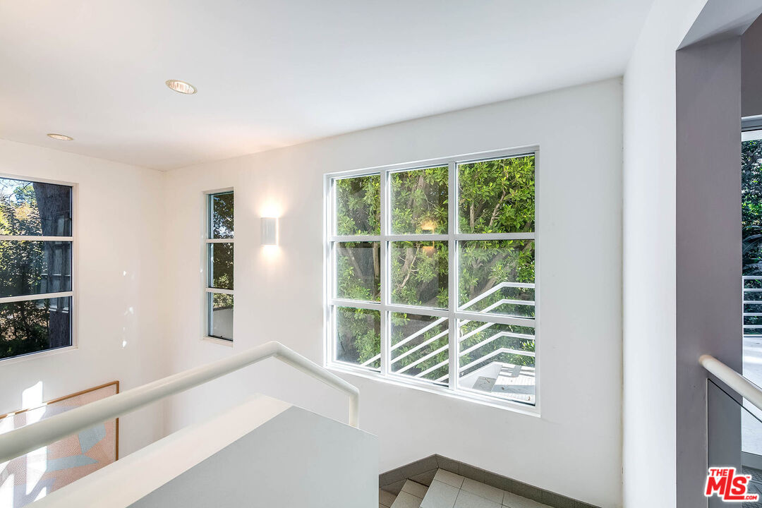 12309 Viewcrest Road Studio City, CA 91604 - Photo 24 of 52 a view of an empty room with a window