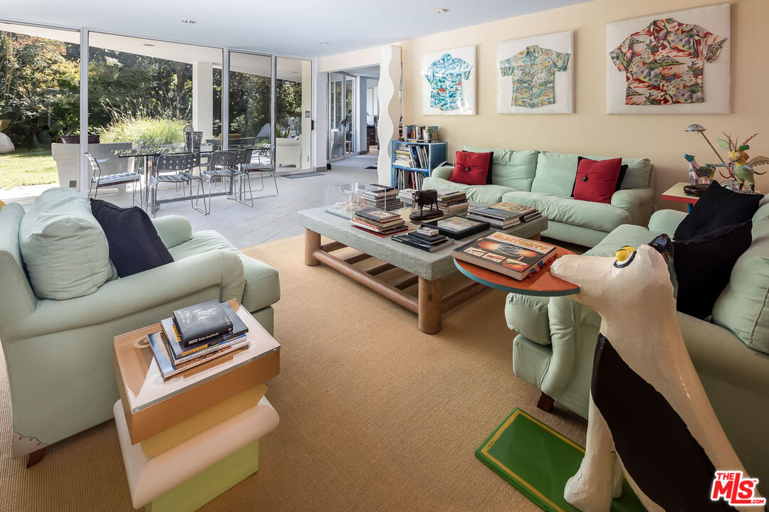 12309 Viewcrest Road Studio City, CA 91604 - Photo 25 of 52 a living room with furniture and a large window