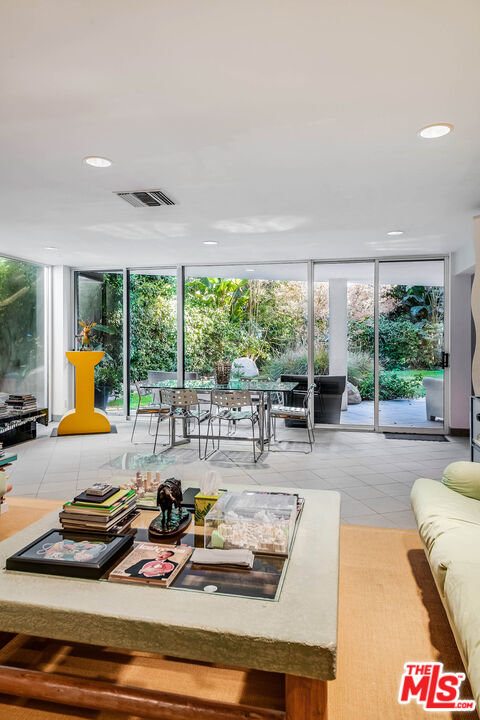 12309 Viewcrest Road Studio City, CA 91604 - Photo 28 of 52 a living room with furniture and a large window