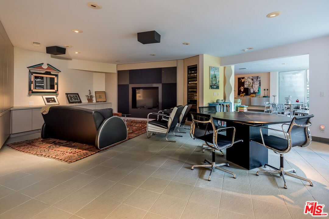 12309 Viewcrest Road Studio City, CA 91604 - Photo 30 of 52 a view of a livingroom with workspace and dining room