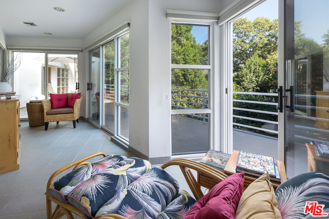 12309 Viewcrest Road Studio City, CA 91604 - Photo 34 of 52 a bedroom with a bed and a window