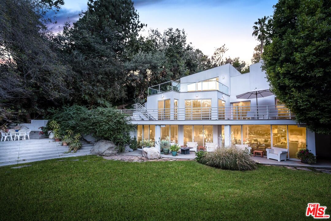 12309 Viewcrest Road Studio City, CA 91604 - Photo 49 of 52 a view of a house with a yard and sitting area