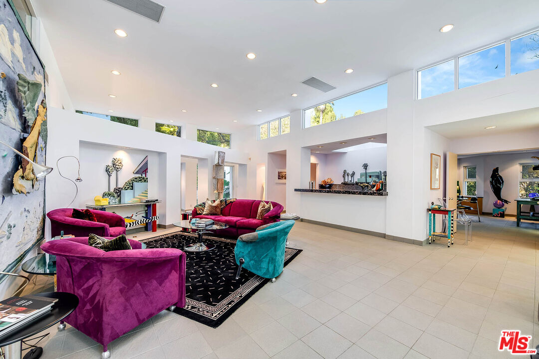 12309 Viewcrest Road Studio City, CA 91604 - Photo 10 of 52 a living room with furniture and a flat screen tv