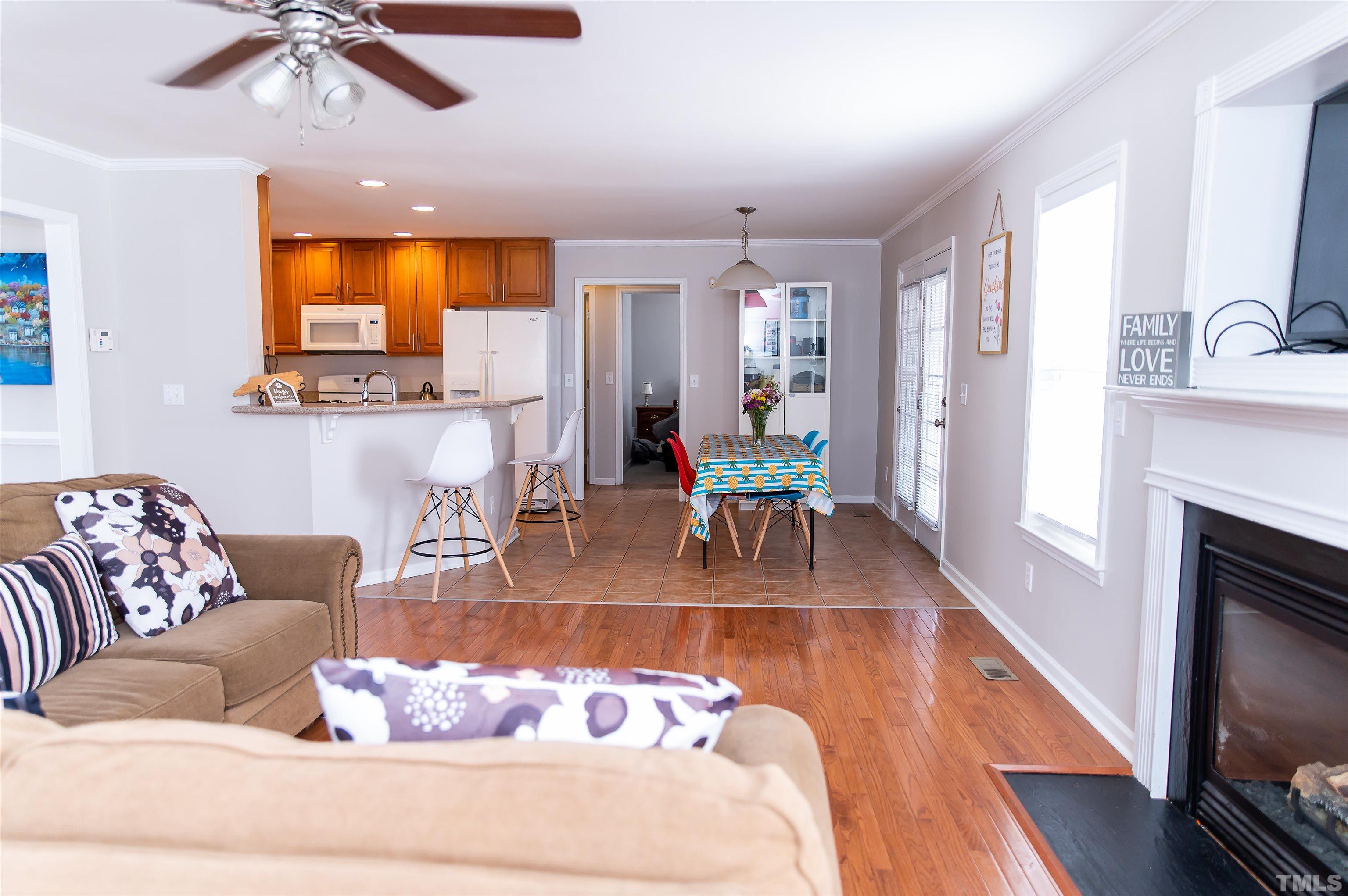 917 Pristine Lane Rolesville, NC 27571 - Photo 13 of 35 a living room with furniture and a fireplace
