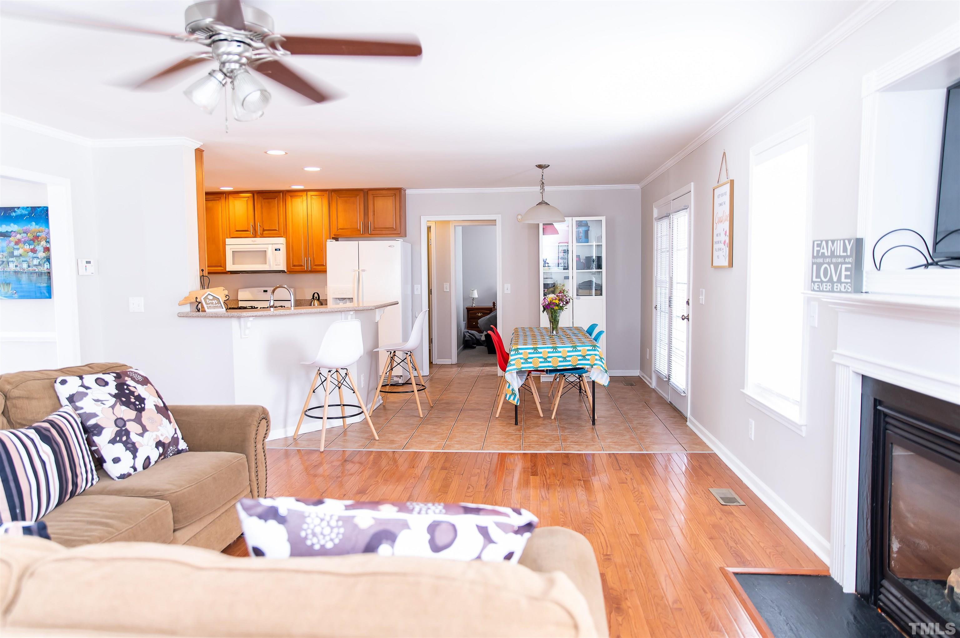 917 Pristine Lane Rolesville, NC 27571 - Photo 14 of 35 a living room with furniture and a fireplace