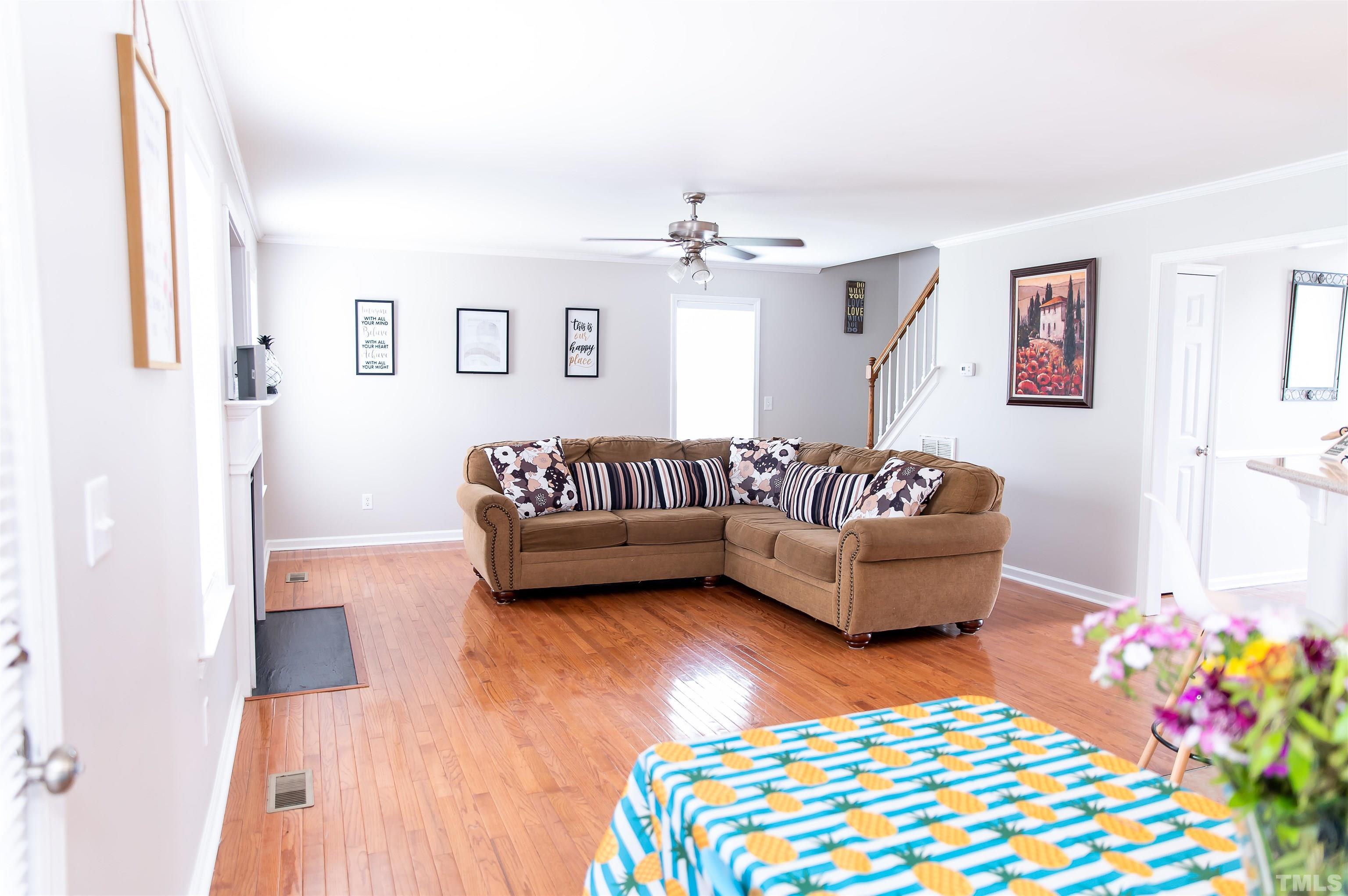 917 Pristine Lane Rolesville, NC 27571 - Photo 17 of 35 a living room with furniture and a couch