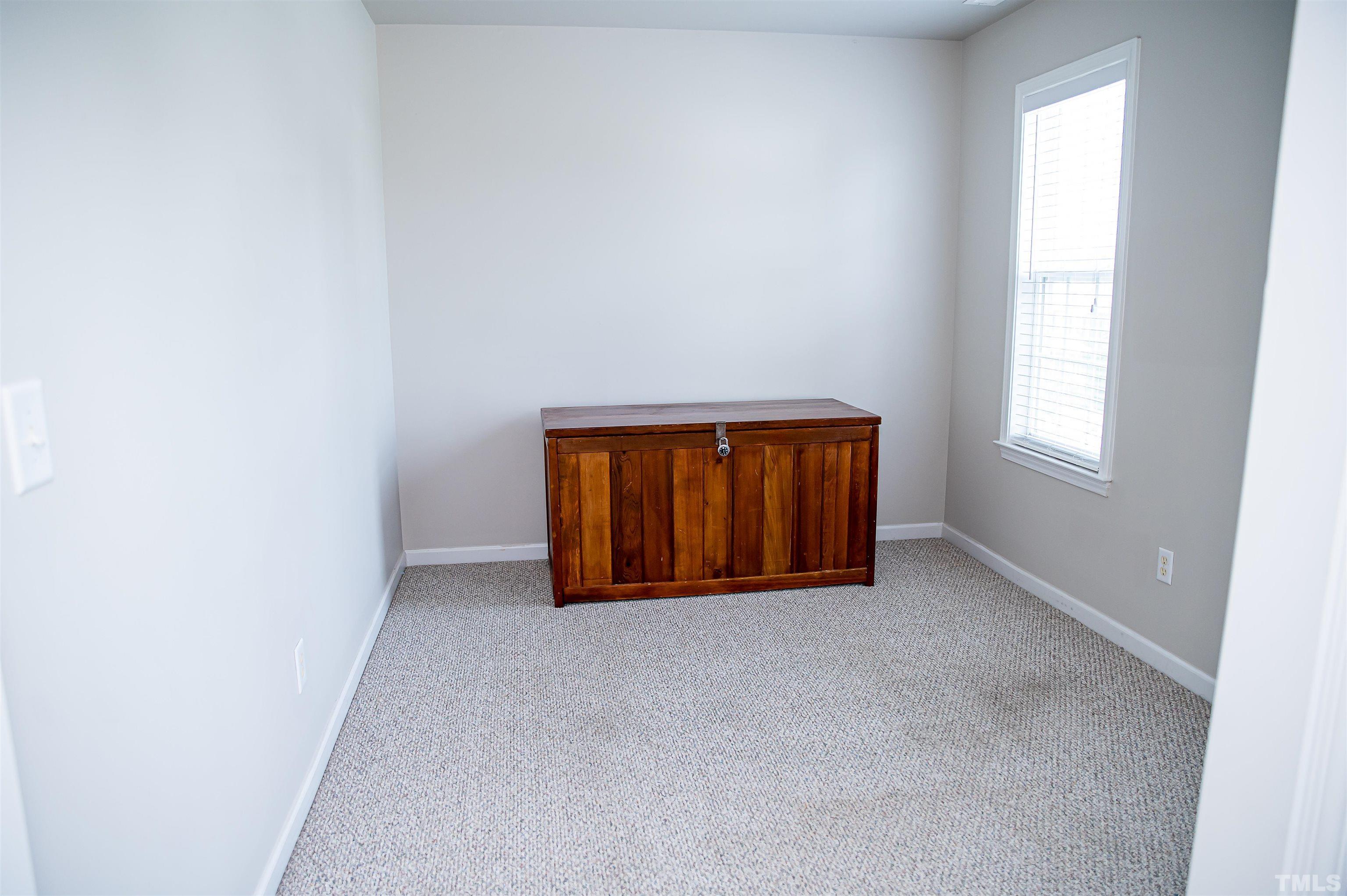917 Pristine Lane Rolesville, NC 27571 - Photo 23 of 35 an empty room with windows