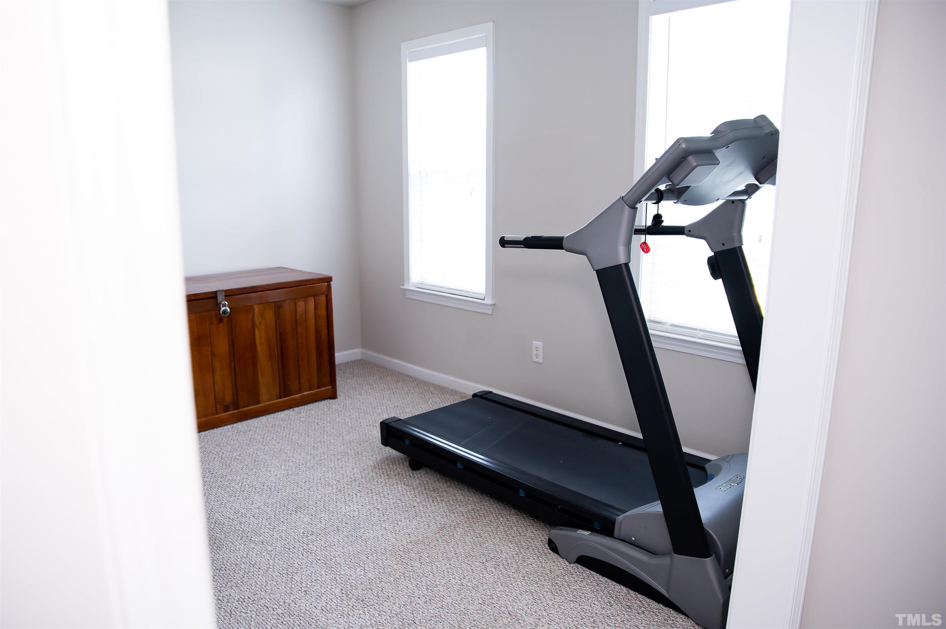 917 Pristine Lane Rolesville, NC 27571 - Photo 24 of 35 a living room with furniture and a window