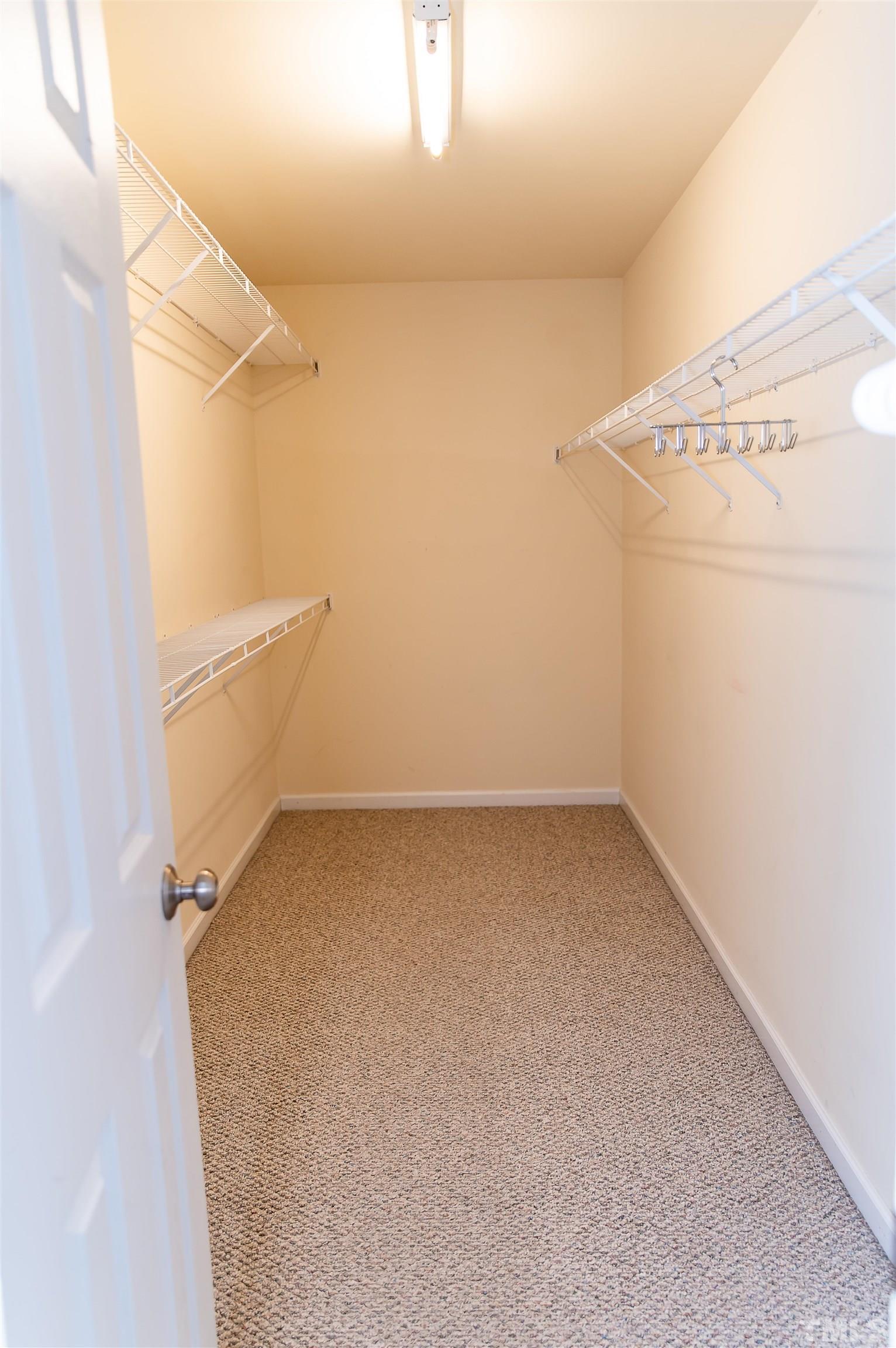 917 Pristine Lane Rolesville, NC 27571 - Photo 29 of 35 a view of a room with racks on the wall