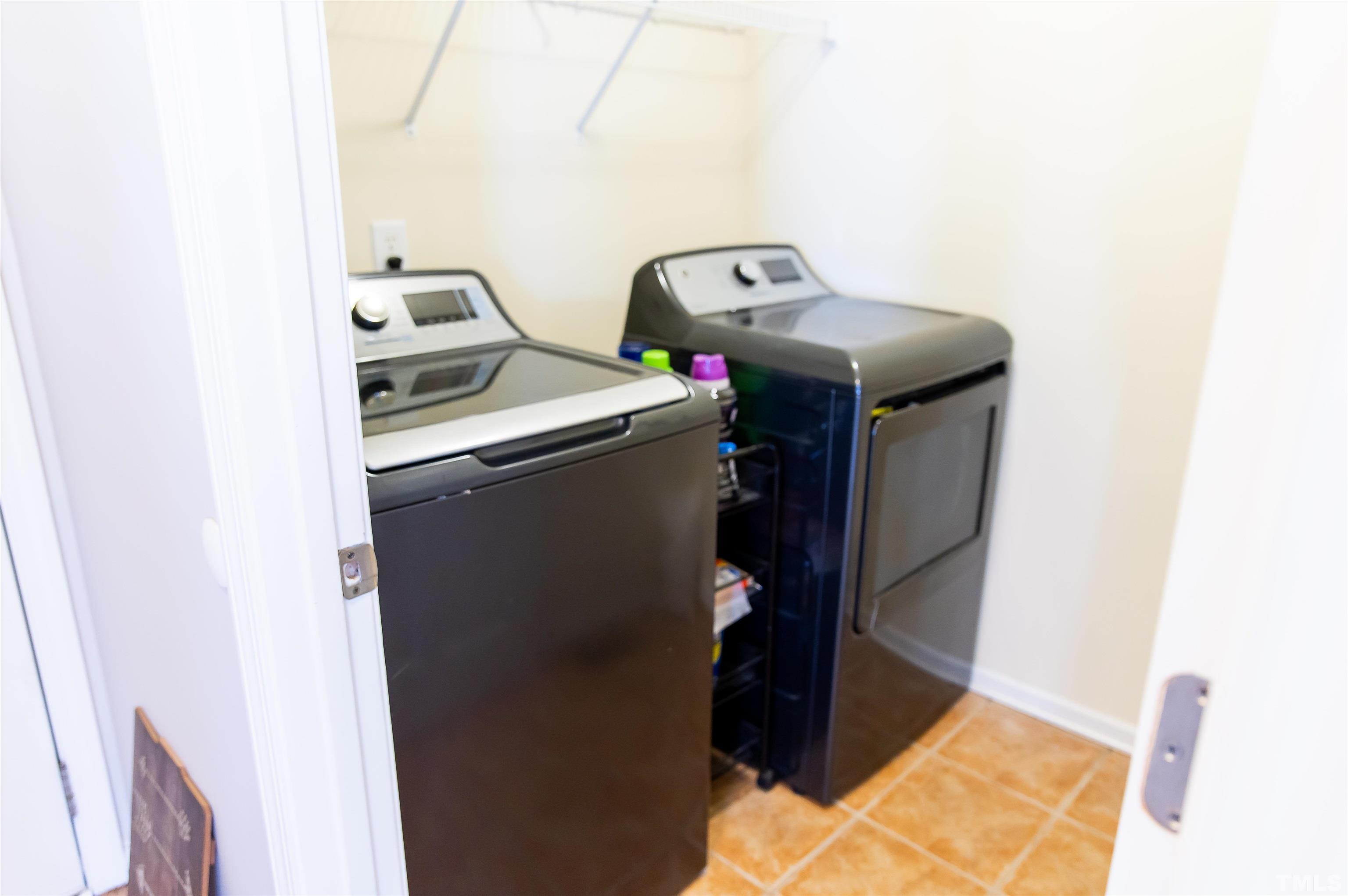 917 Pristine Lane Rolesville, NC 27571 - Photo 9 of 35 a utility room with dryer and washer