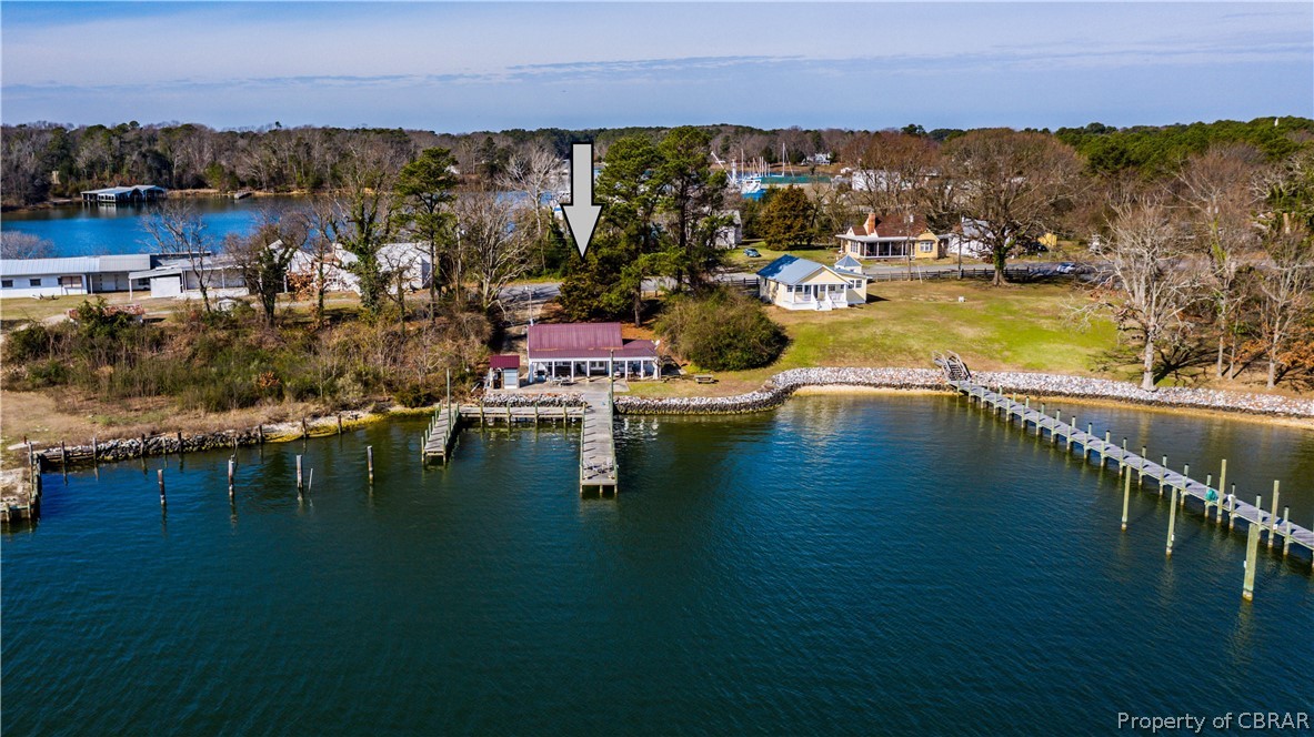 1167 Johns Neck Road Weems, VA 22576 - Photo 42 of 48 a view of a lake with houses