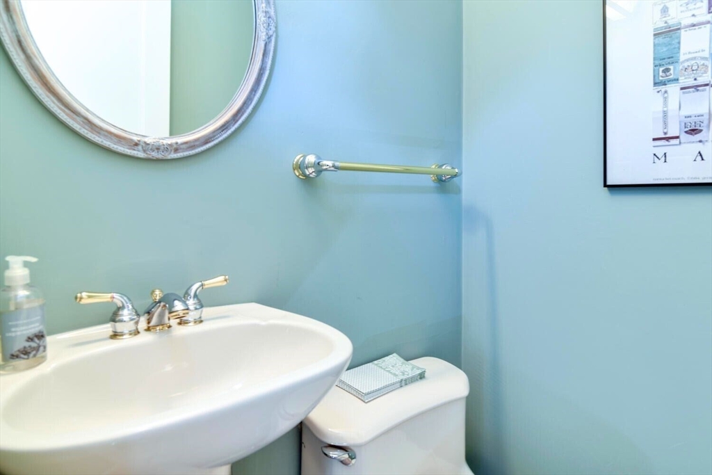 15 Selden Street Newton, MA 02468 - Photo 15 of 33 a bathroom with a sink and a mirror