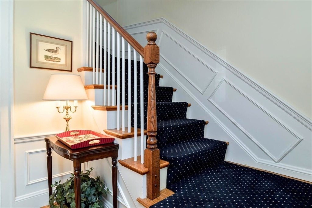 15 Selden Street Newton, MA 02468 - Photo 16 of 33 a view of entryway and hall with wooden floor