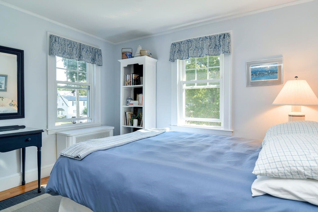 15 Selden Street Newton, MA 02468 - Photo 18 of 33 a bedroom with a bed and a window