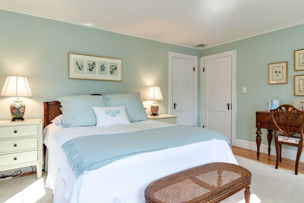 15 Selden Street Newton, MA 02468 - Photo 20 of 33 a bedroom with a bed and a chair