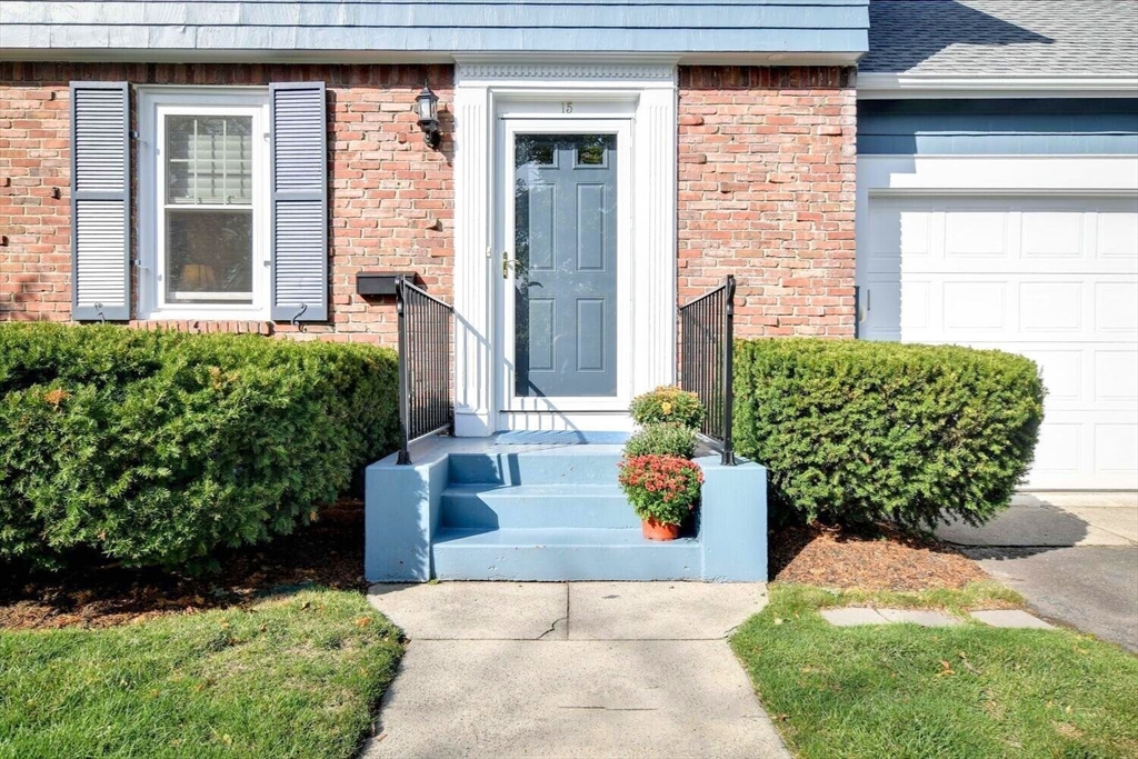 15 Selden Street Newton, MA 02468 - Photo 2 of 33 a view of a brick house with potted plants