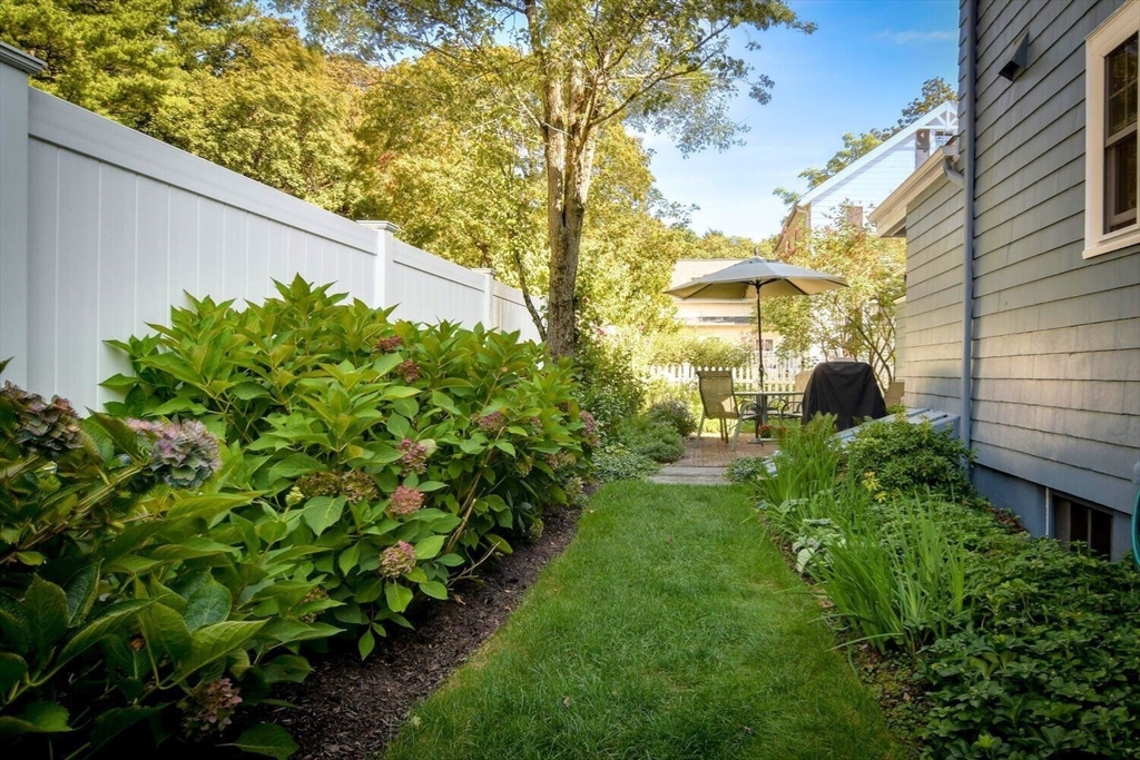15 Selden Street Newton, MA 02468 - Photo 27 of 33 a backyard of a house with lots of green space