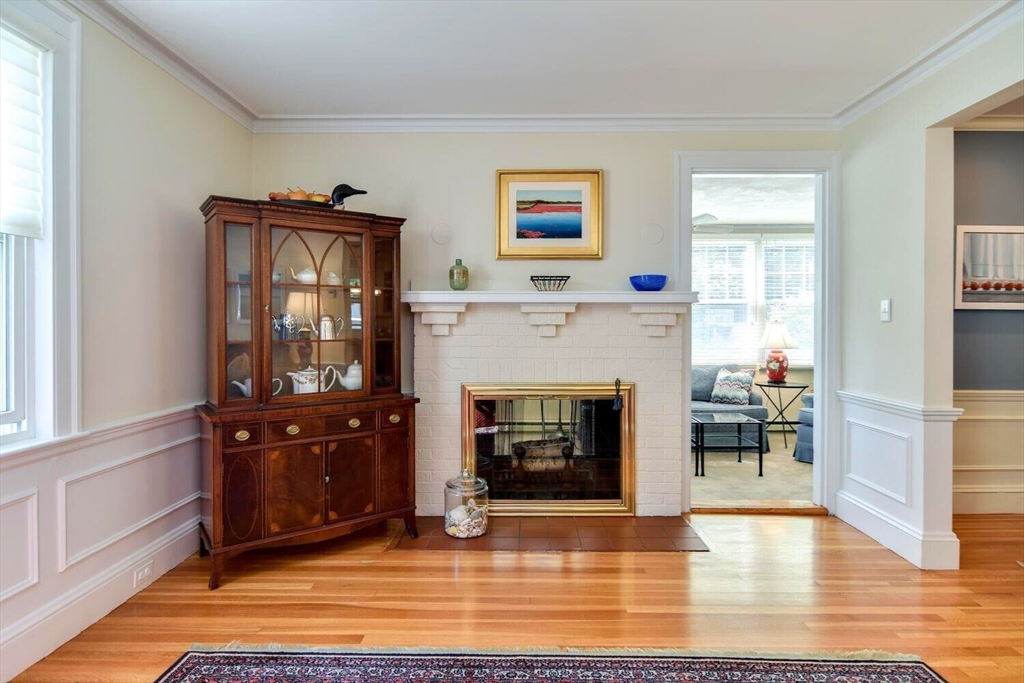 15 Selden Street Newton, MA 02468 - Photo 6 of 33 a living room with furniture and a fireplace