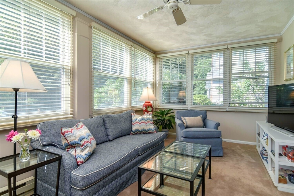 15 Selden Street Newton, MA 02468 - Photo 9 of 33 a living room with furniture and a flat screen tv