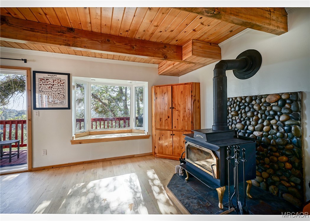 33469 Music Camp Road Running Springs, CA 92382 - Photo 12 of 27 a view of a livingroom with furniture and staircase