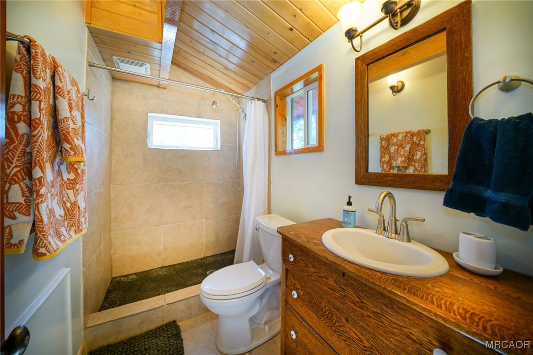 33469 Music Camp Road Running Springs, CA 92382 - Photo 20 of 27 a bathroom with a sink and a mirror