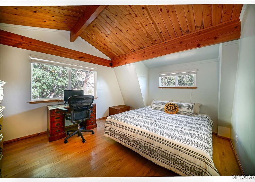 33469 Music Camp Road Running Springs, CA 92382 - Photo 21 of 27 a bedroom with a bed and a desk