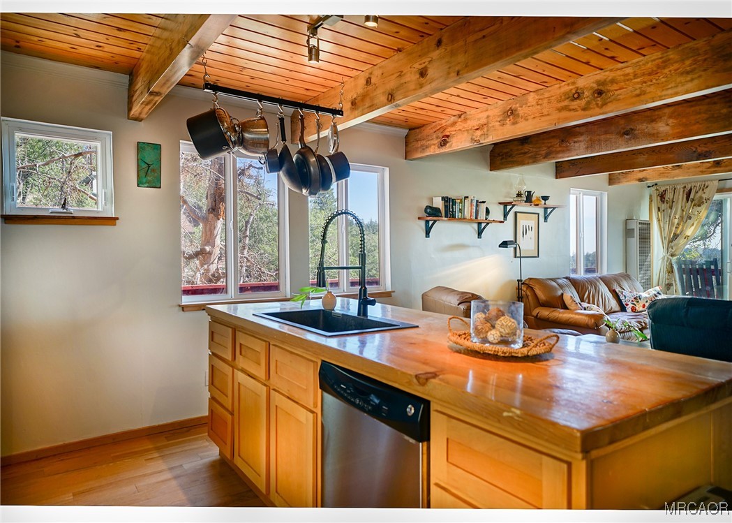 33469 Music Camp Road Running Springs, CA 92382 - Photo 3 of 27 a kitchen with a sink and a refrigerator