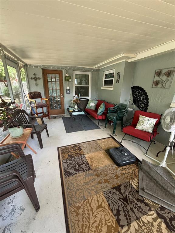 10909 Bridleton Road Port Richey, FL 34668 - Photo 15 of 19 Screened Porch