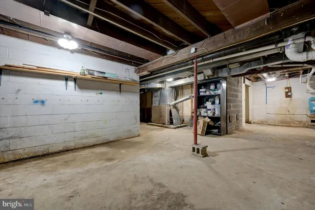 a balcony with view of swimming pool and furniture