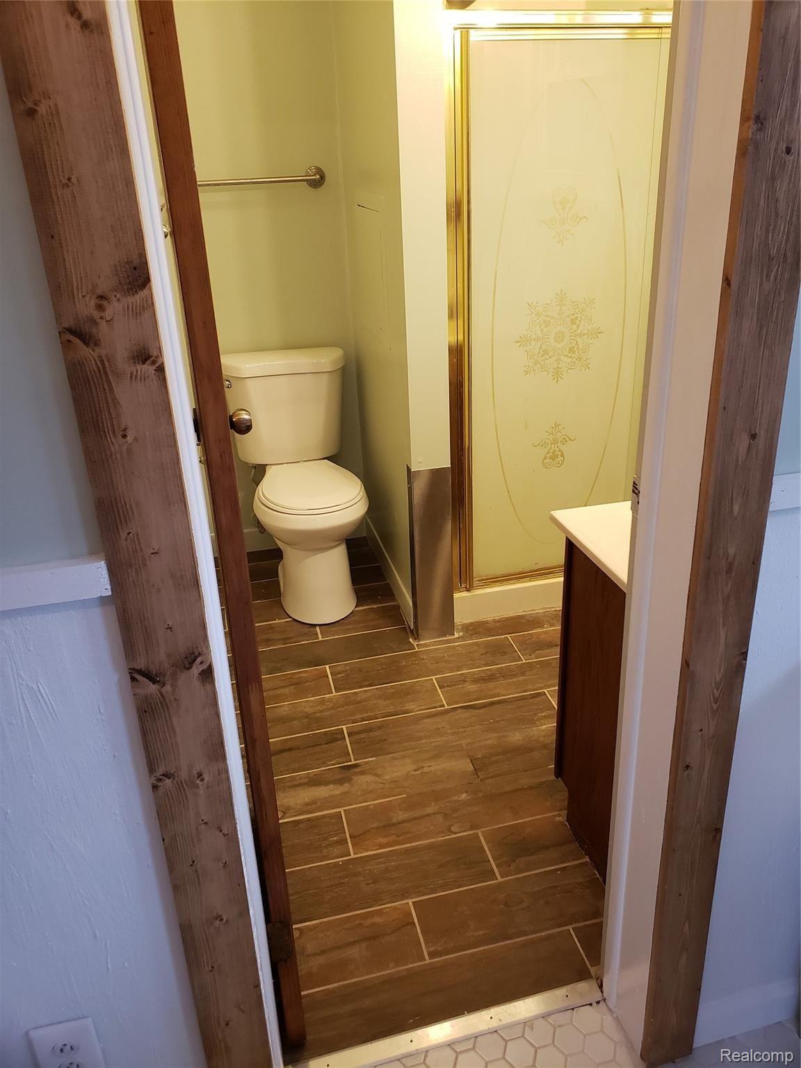 2465 Carpenter Road Lapeer, MI 48446 - Photo 27 of 28 Bathroom by the laundry room