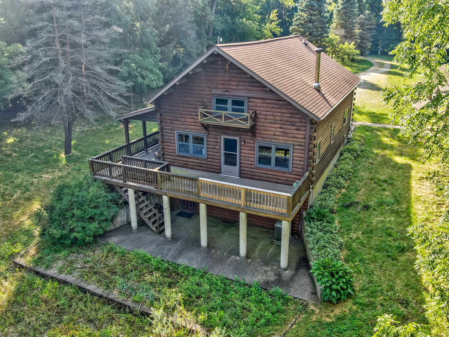 1901 East 1251st Road Streator, IL 61364 - Photo 1 of 32 a view of a house with a chairs in patio