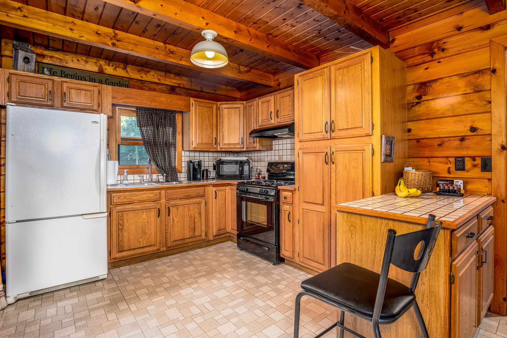 1901 East 1251st Road Streator, IL 61364 - Photo 7 of 32 a kitchen with stainless steel appliances granite countertop a refrigerator and a stove top oven