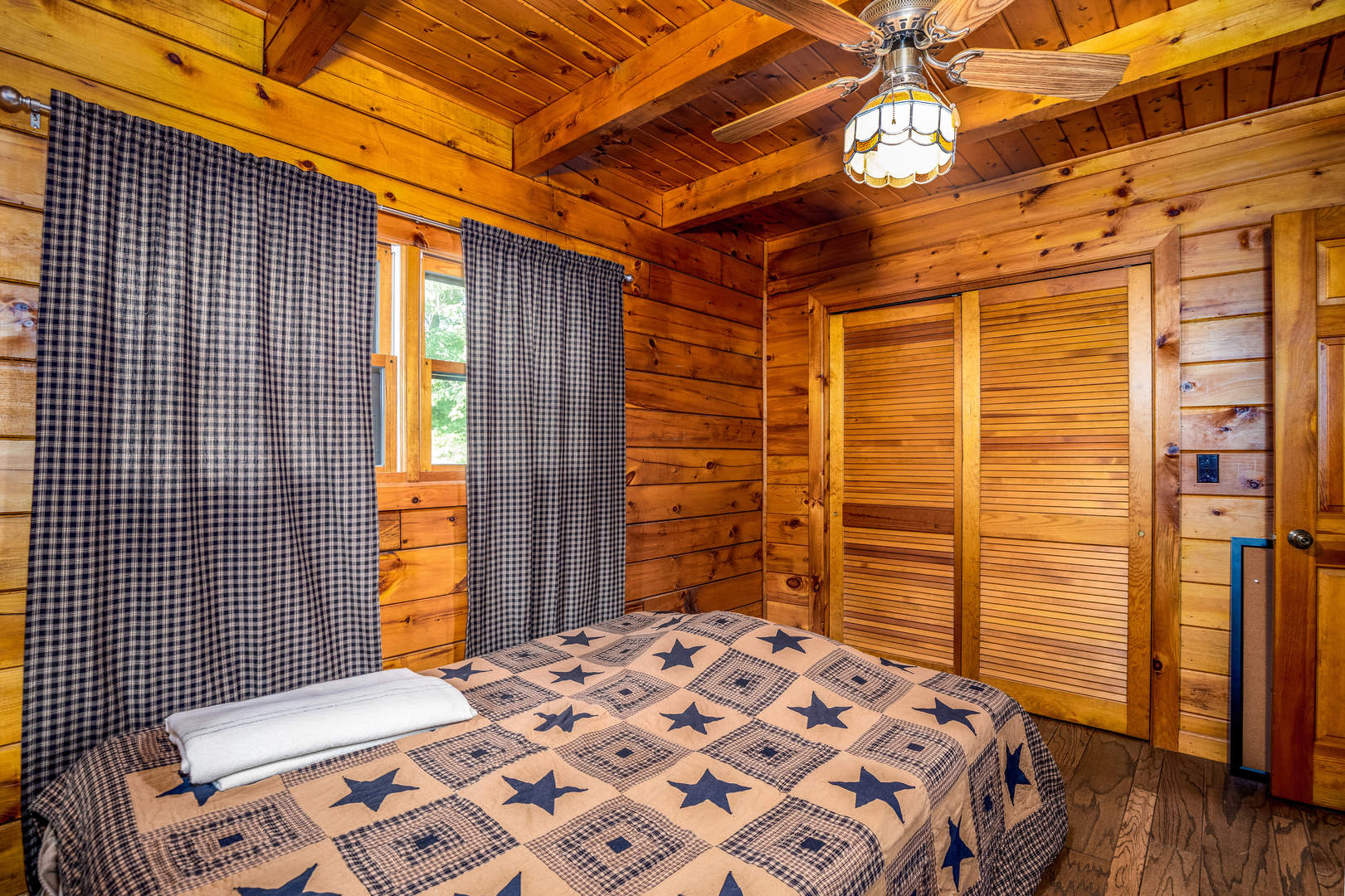 1901 East 1251st Road Streator, IL 61364 - Photo 8 of 32 a bedroom with a bed and wooden floor