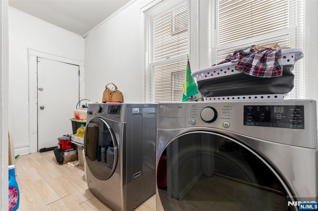 92 South Devine Street Newark, NJ 07106 - Photo 27 of 33 a utility room with dryer and washer