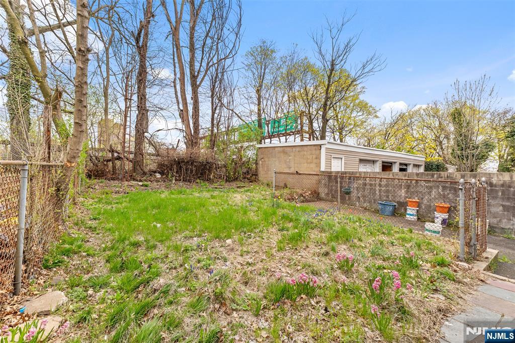 92 South Devine Street Newark, NJ 07106 - Photo 33 of 33 a view of a house with a yard and sitting area