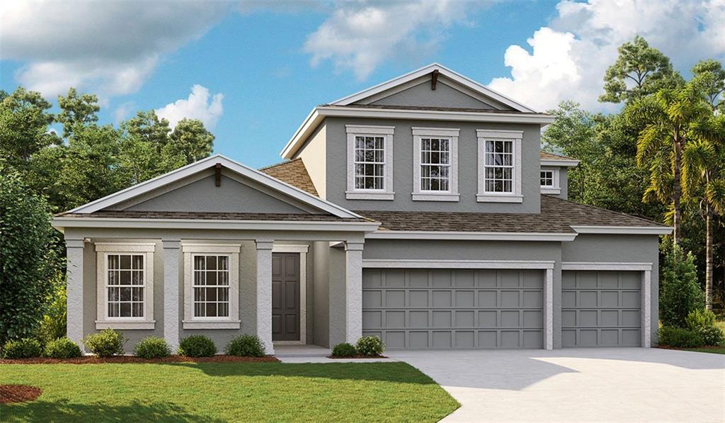 5173 Wildwind Drive Apollo Beach, FL 33572 - Photo 1 of 1 front view of a house with a yard