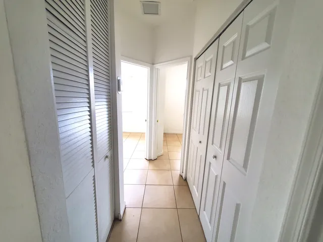 a bathroom with a shower and a tub