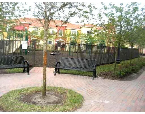 a view of a bench in a park