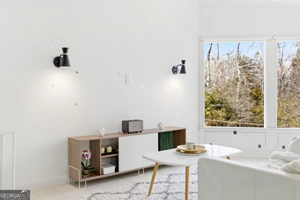 a room with furniture and window
