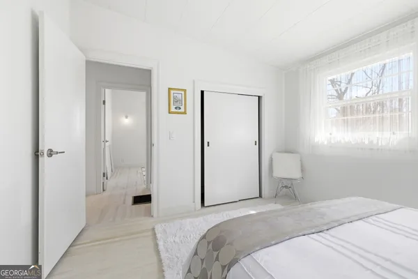 a view of a balcony with trees