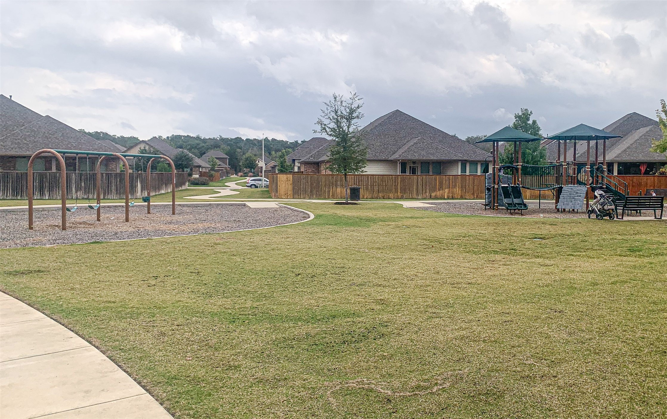 316 Buffalo Ridge Drive Manchaca, TX 78652 - Photo 36 of 37 a view of a house with a big yard and large trees